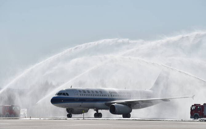 (200328) -- CHANGBAISHAN, March 28, 2020 -- An airplane carrying medics supporting virus-hit Hubei Province receives a water cannon salute as it lands at Changbaishan Airport in northeast China s Jilin Province, March 28, 2020. The third batch of medical assistance teams from Jilin, which consists of 404 members, returned from Hubei as the epidemic outbreak in the hard-hit province has been subdued. ) CHINA-JILIN-MEDICAL TEAM-RETURN FROM HUBEI (CN) LinxHong 