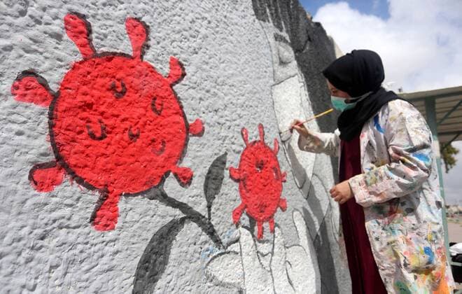 March 28, 2020, Khan Younis, Gaza Strip, Palestinian Territory: Palestinian artists draw a mural during awareness campaign about the coronavirus COVID-19, in Khan Younis in the southern of Gaza Strip on March 28, 2020 Khan Younis Palestinian Territory - ZUMAap3_ 20200328_zaf_ap3_034 Copyright: xAshrafxAmrax