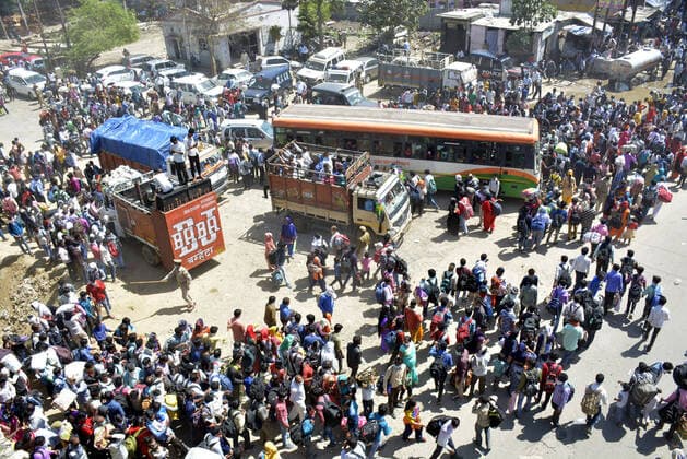 GHAZIABAD, INDIA - MARCH 28: An aerial view of Lal Kuan bus stand where a wave of migrant workers was seen following Uttar Pradesh government?s call to arrange buses for the workers returning to their native state, on Day 4 of the 21 day nationwide lockdown -- to check the spread of coronavirus, on March 28, 2020 in Ghaziabad, India. (Photo by Sakib Ali Hindustan Times ) Coronavirus Update: Amid Lockdown, A Sea Of Migrants In Delhi-NCR Try To Find Their Way Back Home