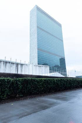 Sightseeing in New York City in times of COVID-19 United Nations Headquarters with empty flagpoles in Manhattan New York New York United States Copyright: LevxRadin