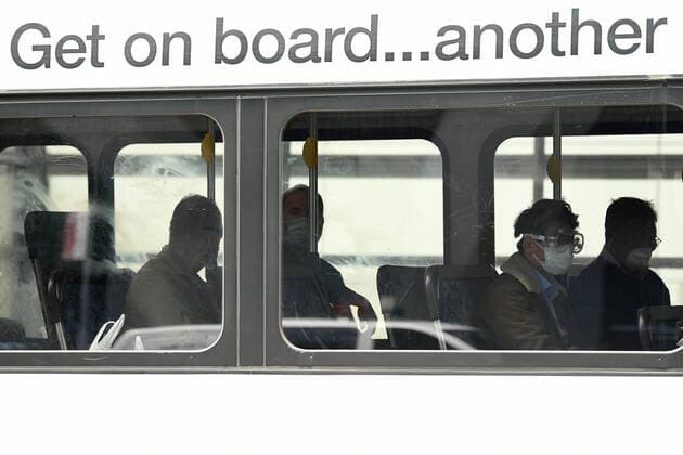 AUSTRALIA CORONAVIRUS COVID-19, Returning overseas travellers wait on a bus at the beginning of their 14-day imposed quarantine after arriving at Sydney International Airport in Sydney, Sunday, March 29, 2020. ( NO ARCHIVING, EDITORIAL USE ONLY, NO USE IN BOOKS WITHOUT CONSENT SYDNEY NSW AUSTRALIA  Copyright: xJOELxCARRETTx 20200329001460668950