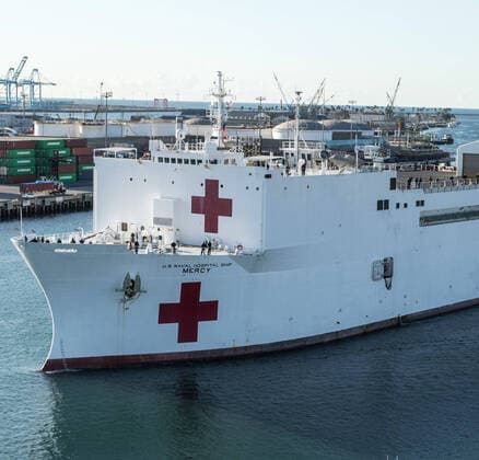 March 29, 2020, Los Angeles, California, United States Of America: LOS ANGELES, CA - MARCH 27: The Military Sealift Command hospital ship USNS Mercy (T-AH 19) arrives in Los Angeles, Calif., March 27, 2020. Mercy deployed in support of the nationâ€⠢s COVID-19 response efforts, and will serve as a referral hospital for non-COVID-19 patients currently admitted to shore-based hospitals. This allows shore base hospitals to focus their efforts on COVID-19 cases. One of the Department of Defenseâ€⠢s missions is Defense Support of Civil Authorities. DOD is supporting the Federal Emergency Management Agency, the lead federal agency, as well as state, local and public health authorities in helping protect the health and safety of the American people on March 27, 2020 in Los Angeles, California..People: USNS Mercy Los Angeles United St - ZUMAn287 20200329_zaa_n287_004 Copyright: xSMGx