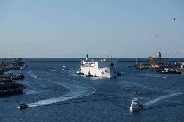 March 29, 2020, Los Angeles, California, United States Of America: LOS ANGELES, CA - MARCH 27: The Military Sealift Command hospital ship USNS Mercy (T-AH 19) arrives in Los Angeles, Calif., March 27, 2020. Mercy deployed in support of the nationâ€⠢s COVID-19 response efforts, and will serve as a referral hospital for non-COVID-19 patients currently admitted to shore-based hospitals. This allows shore base hospitals to focus their efforts on COVID-19 cases. One of the Department of Defenseâ€⠢s missions is Defense Support of Civil Authorities. DOD is supporting the Federal Emergency Management Agency, the lead federal agency, as well as state, local and public health authorities in helping protect the health and safety of the American people on March 27, 2020 in Los Angeles, California..People: USNS Mercy Los Angeles United St - ZUMAn287 20200329_zaa_n287_006 Copyright: xSMGx