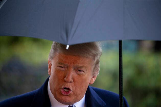 March 28, 2020, Washington, District of Columbia, USA: United States President Donald J. Trump talks to the media before he boards Marine One on the South Lawn of the White House President Donald Trump heads to Naval Station Norfolk to send off The USNS COMFORT for Deployment to New York City for response to the rapid spread of the coronavirus. Washington USA - ZUMAs152 20200328_zaa_s152_015 Copyright: xTasosxKatopodisx