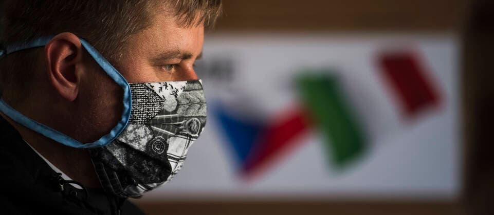 Czech Foreign Affairs Minister Tomas Petricek (Social Democrats, CSSD) prepares boxes with an aid, in Opocinek, Pardubice, Czech Republic, on March 29, 2020. The Czech Republic launched its aid to Spain and Italy, the European countries that are the most afflicted by the novel coronavirus pandemic, sending 20,000 protective suits from the police storage facility in Opocinek to them. (CTKxPhoto JosefxVostarek) CTKPhotoP202003290114801 JVO 001
