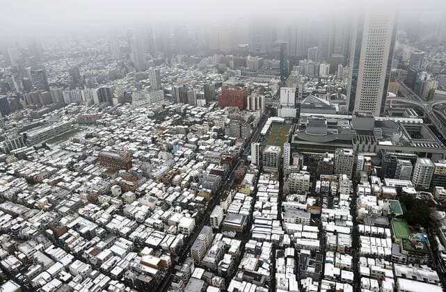 Out-of-season snow in Tokyo Photo taken March 29, 2020, from a Kyodo News helicopter shows Tokyo s Shibuya area being covered with out-of-season snow. 