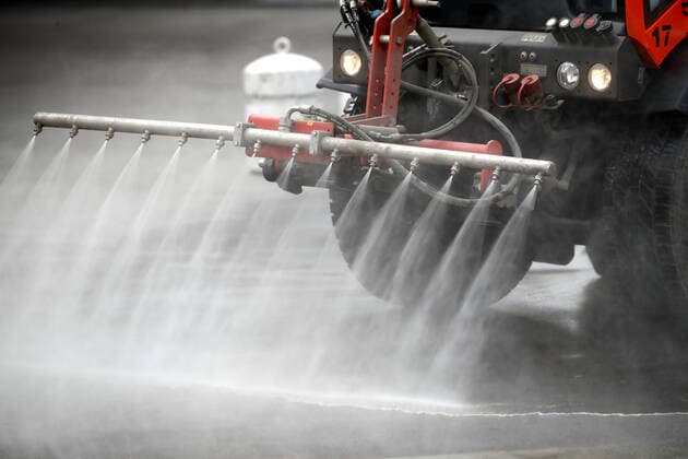 MOSCOW, RUSSIA - MARCH 29, 2020: A street sweeper cleans the pavement in Stary Arbat Street during the pandemic of the novel coronavirus (COVID-19). As of 29 March 2020, Russia has reported more than 1200 confirmed cases of the novel coronavirus (COVID-19), with more than 1000 confirmed cases in Moscow. Artyom Geodakyan TASS  TS0D3C4B