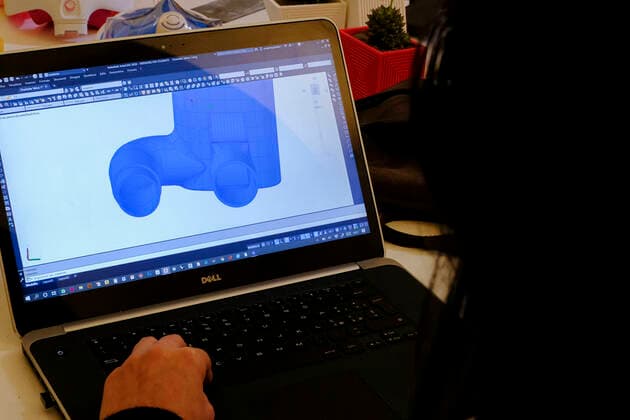 The 3D model of the adapter to transform a snorkelling mask distributed by Decathlon into an oxygen surgery mask to improve the care for Sars-Cov2 patients seriously ill in Italians hospitals is on a screen of a laptop in Remade 3D graphics laboratory that participate to a project made by Isinnova who shared his idea. In Italy hospitals are almost full and more intensive care equipment is needed.  Copyright: xAntonioxBalascox xIPAx xAntonioxBalascox