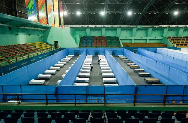March 29, 2020, Guwahati, Assam, India: Workers are busy preparing a quarantine facility for COVID-19 patients at the Sarusojai sports complex, during a nationwide lockdown in the wake of COVID-19 coronavirus pandemic, in Guwahati. Guwahati India - ZUMAt232 20200329_zip_t232_003 Copyright: xDavidxTalukdarx