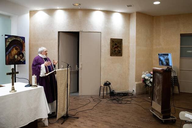 Paris, France, March 29, 2020 - Mass celebrated by videoconference during the Covid-19 epidemic inside the chapel of Sainte Odile church - In the presence of father Stephane Biaggi  Copyright: xAlexisxSciardx