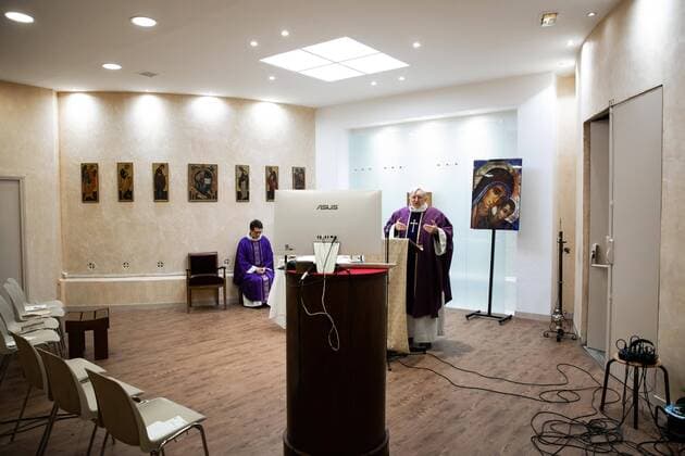 Paris, France, March 29, 2020 - Mass celebrated by videoconference during the Covid-19 epidemic inside the chapel of Sainte Odile church - In the presence of father Stephane Biaggi  Copyright: xAlexisxSciardx