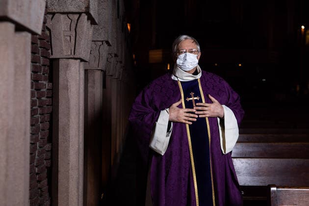Paris, France, March 29, 2020 - Father Stephane Biaggi poses inside Sainte Odile church after celebrating a mass by videoconference during the Covid-19 epidemic.  Copyright: xAlexisxSciardx