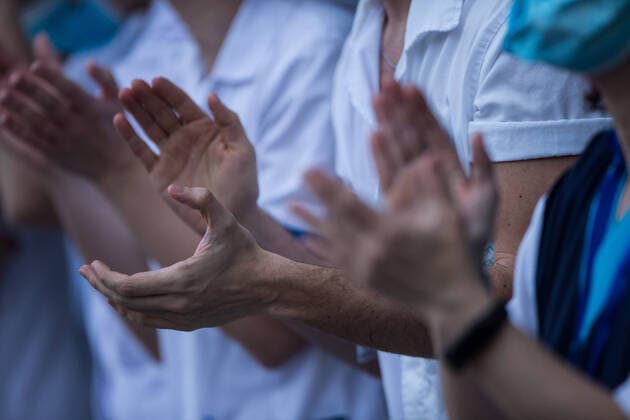 March 29, 2020, Madrid, MADRID, SPAIN: Details of the tribute to the Spanish health at 8 pm at the Hospital Universitario Fundacion Jimenez Diaz at the end of the second week after the Government declared the state of alarm in Spain and recommended people to stay at home to fight coronavirus COVID-19 on March 29, 2020 in Madrid, Spain Madrid SPAIN - ZUMAa181 20200329_zaa_a181_115 Copyright: xJoaquinxCorcherox