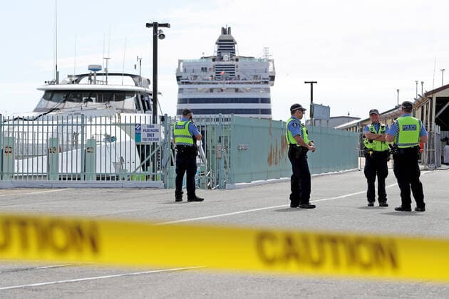 COVID-19 CRUISE PASSENGERS PERTH, Police are seen at Fremantle harbour on Monday, March 30, 2020. West Australian passengers are due to be taken off the cruise ship Vasco da Gama to Rottnest island for 14 days quarantine. The Vasco da Gama had about 800 Australians onboard, including 200 passengers from WA and 108 New Zealanders who were flown back home on Sunday. There were no reports of passengers having contracted the coronavirus. ( NO ARCHIVING, EDITORIAL USE ONLY, NO USE IN BOOKS WITHOUT CONSENT PERTH WA AUSTRALIA  Copyright: xRICHARDxWAINWRIGHTx 20200330001460799286
