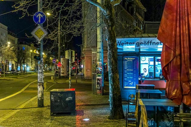 Due to the current general decree for protection against the corona virus, Leipzig has become a ghost town Only a few people go out onto the streets late in the evening Where otherwise highly frequented bars are open, there is a yawning emptiness