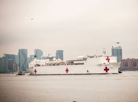 New York during the COVID-19 pandemic Visitors to Hudson River Park in New York greet the USNS Comfort hospital ship as it arrives in New York on Monday, March 30, 2020. The ship will berth at Pier 90 and use its 1,000 hospital beds to serve non-COVID-19 patients taken some of the burden off of New York hospitals. (  RichardxB.xLevine