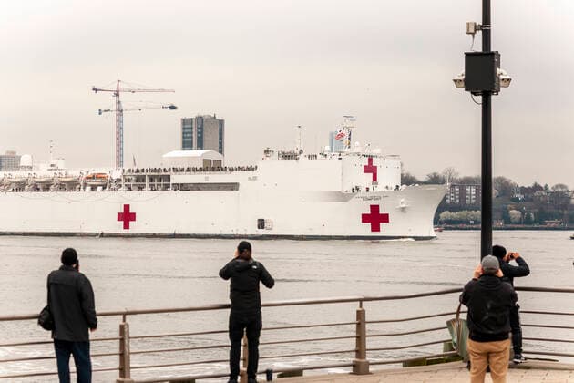 New York during the COVID-19 pandemic Visitors to Hudson River Park in New York greet the USNS Comfort hospital ship as it arrives in New York on Monday, March 30, 2020. The ship will berth at Pier 90 and use its 1,000 hospital beds to serve non-COVID-19 patients taken some of the burden off of New York hospitals. (  RichardxB.xLevine