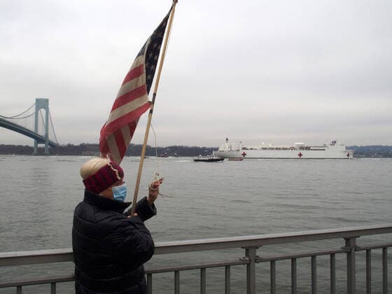 March 30, 2020, New York, New York, USA: The Hospital Ship USNS Comfort arrives in New York. USNS Comfort sails under the Verrazano Narrows bridge then proceeds to go past the Statue of Liberty to it s berth at pier 90 on the Westside of Manhattan. New York USA - ZUMAct2_ 20200330_zaf_ct2_022 Copyright: xBrucexCotlerx