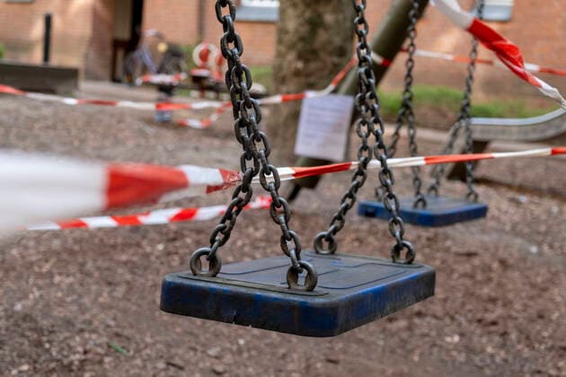 Corona crisis Childrens playground cordoned off with a red and white barrier tape in the courtyard of a residential building in Berlin Prenzlauer Berg So the contact ban should be enforced Corona crisis Children s playground cordoned off with a red and white barrier tape in the courtyard of a residential building in Berlin Prenzlauer Berg So the contact ban should be enforced Corona crisis Childrens playground cordoned off