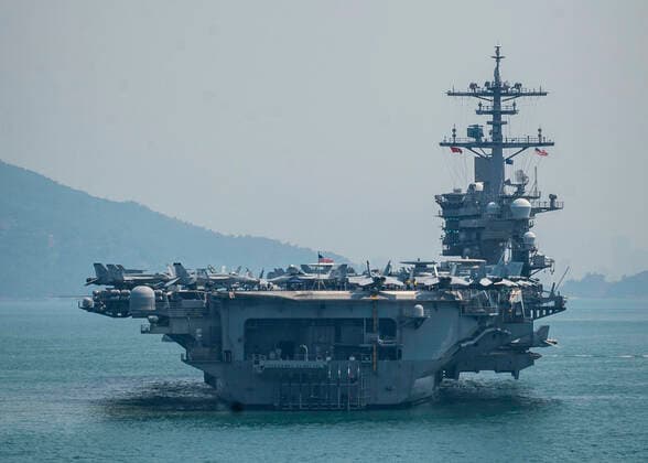 March 9, 2020, Da Nang, Vietnam: The U.S. Navy Nimitz-class aircraft carrier USS Theodore Roosevelt sits at anchor in Da Nang bay March 9, 2020 in Da Nang, Vietnam. The Pacific fleet is visiting Da Nang to commemorate the 25th anniversary of U.S.-Vietnam diplomatic relations. Da Nang Vietnam - ZUMAp138 20200309_zaa_p138_009 Copyright: xNicholasxV.xHuynh U.S.xMarinesx