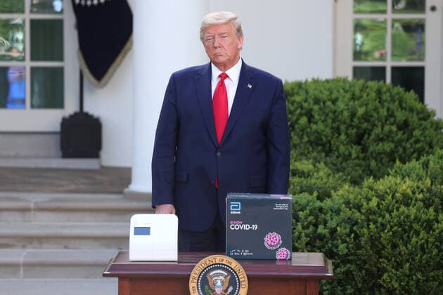 US President Donald J. Trump stands with the Abbot ID NOW COVID-19 test box during the Coronavirus Task Force press briefing on the coronavirus and COVID-19 pandemic, in the Rose Garden at the White House, in Washington, DC, USA, 30 March 2020. Copyright: xMichaelxReynoldsx