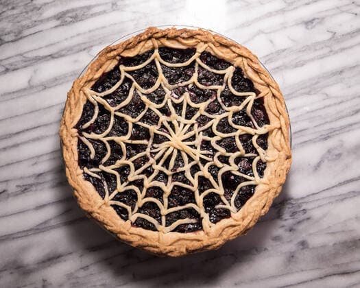Blueberry Pie with Spiderweb Lattice Crust on Marble Pastry Board San Diego, CA, United States CR_JIKO200326-327887-01