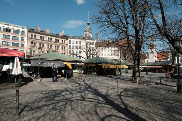 Viktualienmarkt deserted restricted access in Bavaria due to corona pandemic Day 4, Munich on 2020