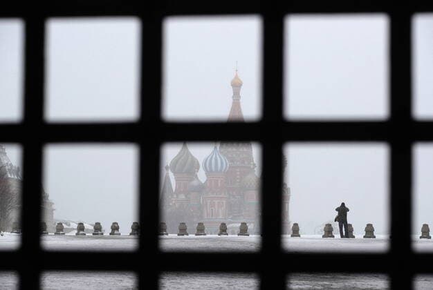 MOSCOW, RUSSIA - MARCH 31, 2020: A deserted Red Square is seen through the Iberian Gate. Russian President Vladimir Putin declared a week off work from 28 March to 5 April 2020 and urged people to stay home to curb the spread of the coronavirus infection. From 30 March 2020, the Moscow government imposed home isolation for all Moscow residents, regardless of their age. Sergei Bobylev TASS  TS0D3F63
