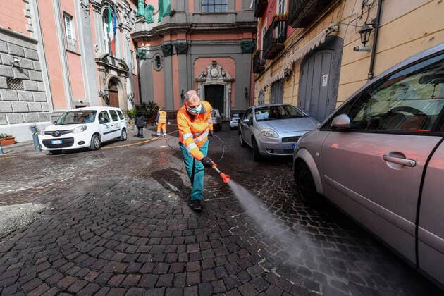 Sanitary workers disinfect the streets, in Naples city to counter the danger of a coronavirus infection (COVID 19).  Copyright: xSalvatorexLaportax xIPAx xKontrolabx
