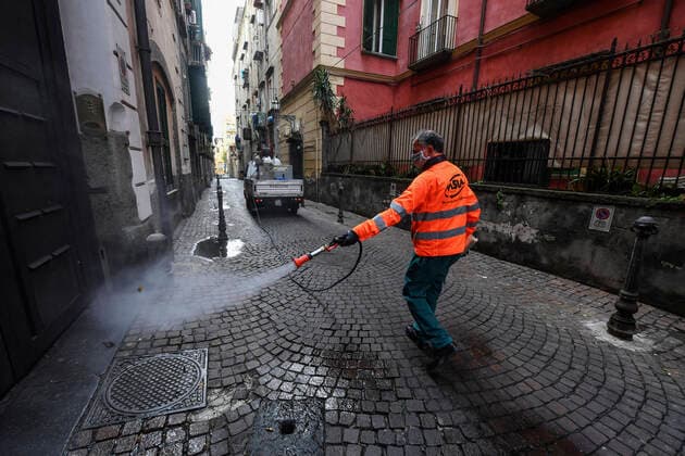 Sanitary workers disinfect the streets, in Naples city to counter the danger of a coronavirus infection (COVID 19).  Copyright: xSalvatorexLaportax xIPAx xKontrolabx
