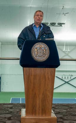 Mayor tours and speaks at USTA Tennis Center NYC mayor Bill de Blasio holds media availability at Billie Jean King National Tennis Center where 350-bed temporary hospital will be built New York New York United States Copyright: LevxRadin