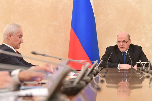 MOSCOW, RUSSIA - APRIL 1, 2020: Russia s Prime Minister Mikhail Mishustin (R) during a meeting of the Presidium of the Russian coordination council on managing the COVID-19 coronavirus at the House of the Russian Government. Pictured: Russia s First Deputy Prime Minister Andrei Belousov (L). Alexander Astafyev POOL TASS  TS0D40C0