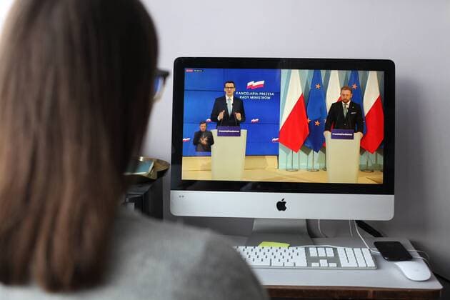 Online press conference of Poland s Prime Minister Mateusz Morawiecki and the Minister of Health Lukasz Szumowski Online press conference of Poland s Prime Minister Mateusz Morawiecki and the Minister of Health Lukasz Szumowski on new restrictions introduced due to the coronavirus outbreak on March 31, 2020 in Warsaw, Poland. EN_01422588_0029 