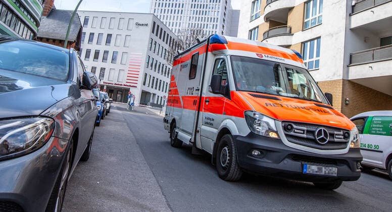 Coronavirus in Berlin Berlin, 01 04 2020, Mitte An ambulance of the Malteser International comes from the entrance of the central emergency room of the Campus Charite Mitte Berlin Berlin Deutschland Mitte