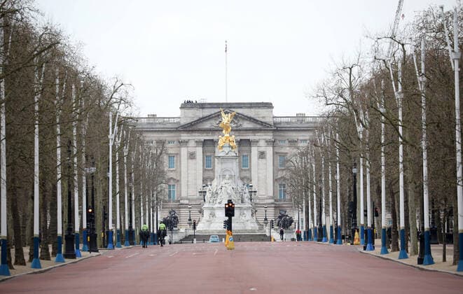 Day Nine of Lockdown in London. Mounted police offices patrol an almost deserted The Mall, with Buckingham Palace in the background. The country is on lockdown due to the COVID-19 Coronavirus pandemic. People are not allowed to leave home except for minimal food shopping, medical treatment, exercise - once a day, and essential work. COVID-19 Coronavirus lockdown, London, UK, on April 1, 2020 