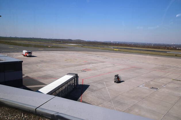 01 04 2020 Dortmund The corona crisis is worsening The federal and state governments are issuing comprehensive guidelines Dortmund citizens are also experiencing severe restrictions in all areas of life The terminal at Dortmund Airport and on the tarmac are yawning empty All flights on the display board have been cancelled There are only a few flights left The fire brigade is holding its ground