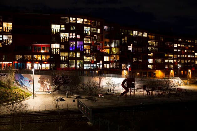Illuminated windows in a residential complex in Schoeneberg in Berlin Schoeneberg on 1 April 2020 In order to slow down the spread of the coronavirus SARS CoV 2, the federal and state governments decided on further restrictions After museums, theatres, spo