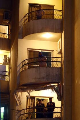 (200402) -- CAIRO, April 2, 2020 -- People watch the balcony concert in Cairo, Egypt on March 31, 2020. Every night, Egyptian violinist Mohammed Adel gives a live concert from his balcony to entertain his neighbors during a coronavirus-caused nationwide nighttime curfew. TO GO WITH: Feature: Egyptian violinist s balcony performances amuse neighbors during nighttime curfew ) EGYPT-CAIRO-CURFEW-BALCONY CONCERT AhmedxGomaa 