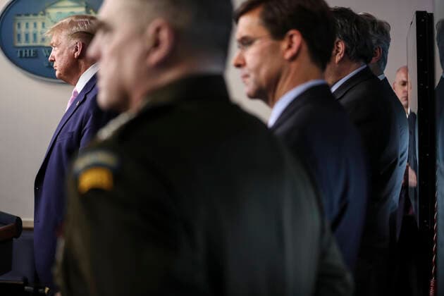 April 1, 2020, Washington, District of Columbia, USA: United States President Donald J. Trump listens during the daily briefing on the novel coronavirus, COVID-19, in the Brady Press Briefing Room of the White House on April 1, 2020 in Washington, DC. Next to Trump, from left, United States Army General Mark A. Milley, Chairman of the Joint Chiefs of Staff; United States Secretary of Defense Dr. Mark T. Esper, US Attorney General William Barr, hidden, and National Security Advisor Robert O Brien, hidden Washington USA - ZUMAs152 20200401_zaa_s152_051 Copyright: xOliverxContrerasx