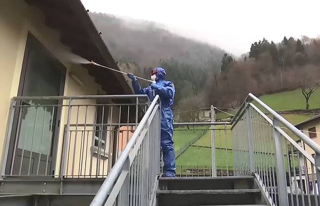 LOMBARDY, ITALY - APRIL 2, 2020: A brigade of Russian epidemiologists and experts of the Troops of Radiological, Chemical and Biological Defence of the Russian Defence Ministry carry out a full disinfection of the Milesi retirement home in the commune of Gromo, the province of Bergamo. Video screen grab. Russian Defence Ministry TASS  TS0D42E8