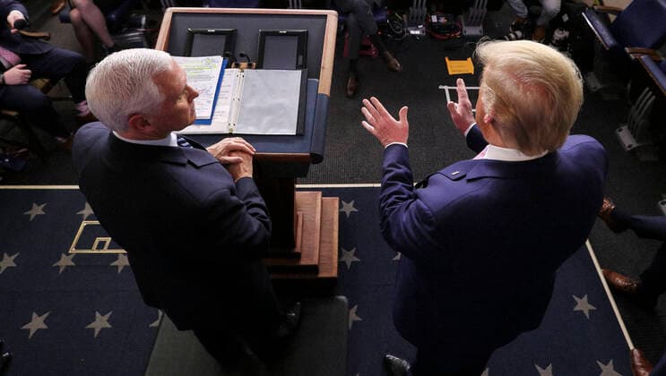 April 1, 2020, Washington, District of Columbia, USA: United States President Donald J. Trump, right, speaks next to US Vice President Mike Pence, left, during the daily briefing on the novel coronavirus, COVID-19, in the Brady Press Briefing Room of the White House on April 1, 2020 in Washington, DC Washington USA - ZUMAs152 20200401_zaa_s152_073 Copyright: xOliverxContrerasx