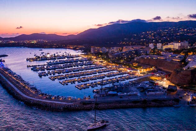 Spain, Balearic Islands, Mallorca, Portals Nous, Puerto Portals, Aerial view of luxury marina at sunset  AMF07886