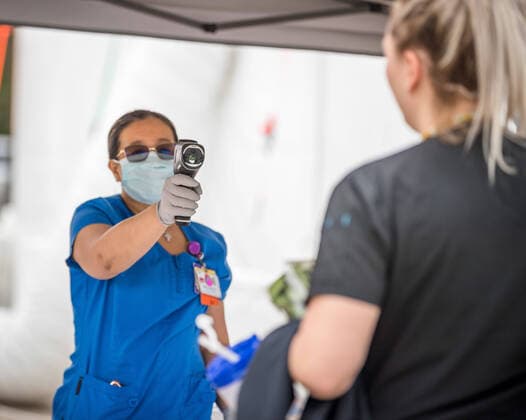 March 28, 2020: A health care worker takes a temperature reading amid the COVID-19 novel coronavirus pandemic. CSM USA - ZUMAc04_ 47113891st Copyright: xPrenticexC.xJamesx