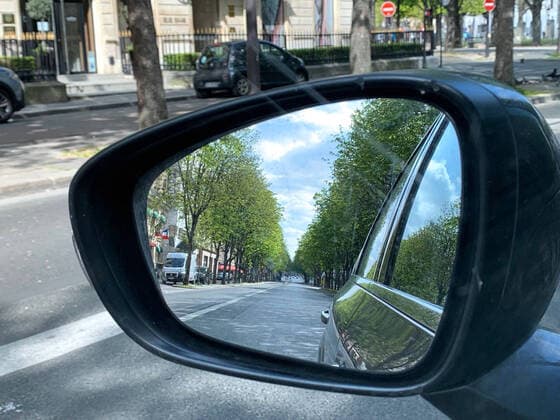 (200402) -- PARIS, April 2, 2020 -- Photo taken on April 2, 2020 through a rear-view mirror shows an empty street in Paris, France. France has registered 471 new fatalities from COVID-19 in hospitals in the past 24 hours, bringing the toll to 4,503, Director General of Health Jerome Salomon announced on Thursday. A total of 26,246 people are now hospitalized, including 6,399 in intensive care, Salomon said at the daily briefing. ) FRANCE-PARIS-COVID-19-CASES TangxJi 
