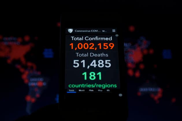 News Bilder des Tages April 2, 2020, Asuncion, Paraguay: Illustration photo - Coronavirus COVID-19 Global Cases by the Center for Systems Science and Engineering (CSSE) at Johns Hopkins University (JHU), data shows global total confirmed cases passes 1 million mark, seen on a smartphone screen backdropped by the JHU CSSE website world map. Asuncion Paraguay - ZUMAc217 20200402_zip_c217_006 Copyright: xAndrexM.xChangx