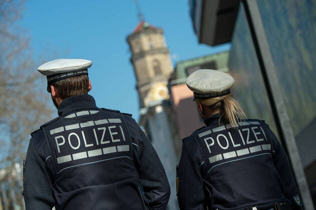 Coronavirus COVID 19 Impressions from an orphaned city Police patrol through Stuttgart with the Stiftskirche in the background Stuttgart centre Baden Württemberg Germany Copyright: xLeif-HendrikxPiechowskix