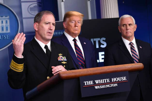 April 2, 2020, Washington, District of Columbia, USA: Rear Admiral John P. Polowczyk, Vice Director, J4, Joint Staff, left, speaks at a Coronavirus briefing at the White House on Thursday, April 2, 2020 in Washington, DC. Due to the COVID-19 pandemic, at least 5,700 people have died in the United States with more than 200,000 infected. More than 10 million people have lost their jobs in the U.S. in the past two weeks. United States President Donald J. Trump, center; and US Vice President Mike Pence. right, look on Washington USA - ZUMAs152 20200402_zaa_s152_077 Copyright: xKevinxDietschx
