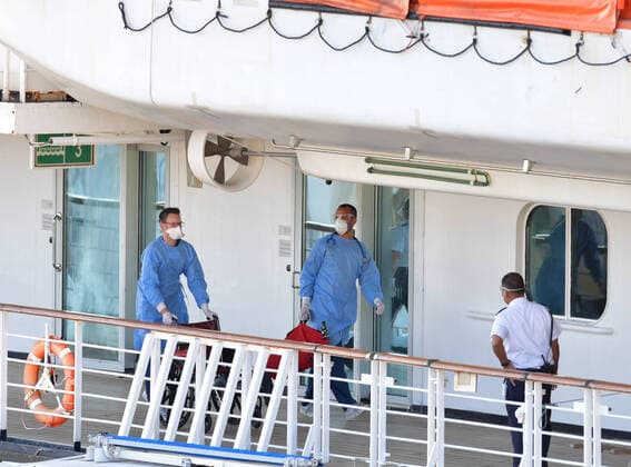 April 2, 2020, Fort Lauderdale, Florida, United States Of America: FORT LAUDERDALE, FL - APRIL 02: COVID-19 -Two Coronavirus-Impacted Cruise Ships the MS Zaandam and MS Rotterdam Cleared to Dock in Port Everglades Florida with dead and sick aboard After Weeks at Sea. While the MS Zaandam arrived first and looked like a ghost ship of death. Seen here the healthy people that were transferred to the MS Rotterdam from the MS Zaandam at sea look joyful as finally a country takes them in on April 2, 2020 at Port Everglades in Fort Lauderdale, Florida..People: MS Rotterdam Fort Lauderdale United States Of America - ZUMAn287 20200402_zaa_n287_161 Copyright: xSMGx