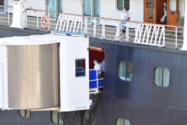April 2, 2020, Fort Lauderdale, Florida, United States Of America: FORT LAUDERDALE, FL - APRIL 02: COVID-19 -Two Coronavirus-Impacted Cruise Ships the MS Zaandam and MS Rotterdam Cleared to Dock in Port Everglades Florida with dead and sick aboard After Weeks at Sea. While the MS Zaandam arrived first and looked like a ghost ship of death. Seen here the healthy people that were transferred to the MS Rotterdam from the MS Zaandam at sea look joyful as finally a country takes them in on April 2, 2020 at Port Everglades in Fort Lauderdale, Florida..People: MS Rotterdam Fort Lauderdale United States Of America - ZUMAn287 20200402_zaa_n287_166 Copyright: xSMGx