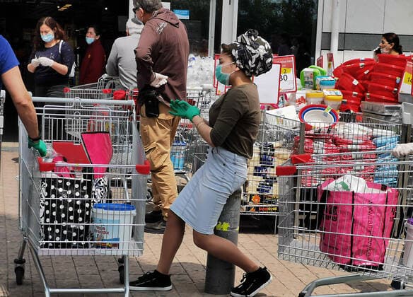 (200403) -- TEL AVIV, April 3, 2020 (Xinhua) -- Citizens wearing face masks are seen outside a supermarket in the central Israeli city of Tel Aviv on April 2, 2020. Israel reported 765 new confirmed cases of COVID-19 on Thursday, the daily highest so far, bringing the total number to 6,857, said the Ministry of Health. (Gideon Markowicz JINI Handout via Xinhua) MIDEAST-TEL AVIV-COVID-19 